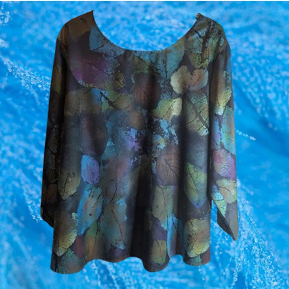 Woman's 2XL NWOT polyester long sleeve multi color polyester woman's blouse.